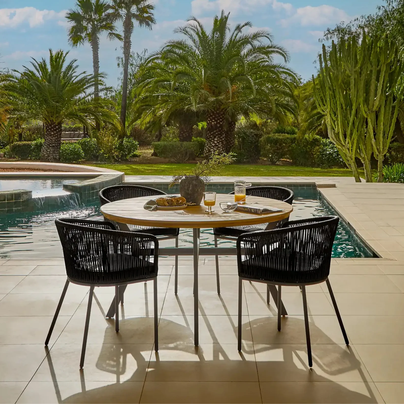 EZRA_130CM_ROUND_TABLE_4_HALI_CHAIRS_BLACKcopy Ezra 4 Seater Round Wooden Garden Dining Set with 4 Hali Black Rope Chairs - Image 1