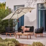 Square 2.4m Cream LED Cantilever Parasol & Raincover with 80kg Quartered Parasol Base - Black Plastic - Image 2