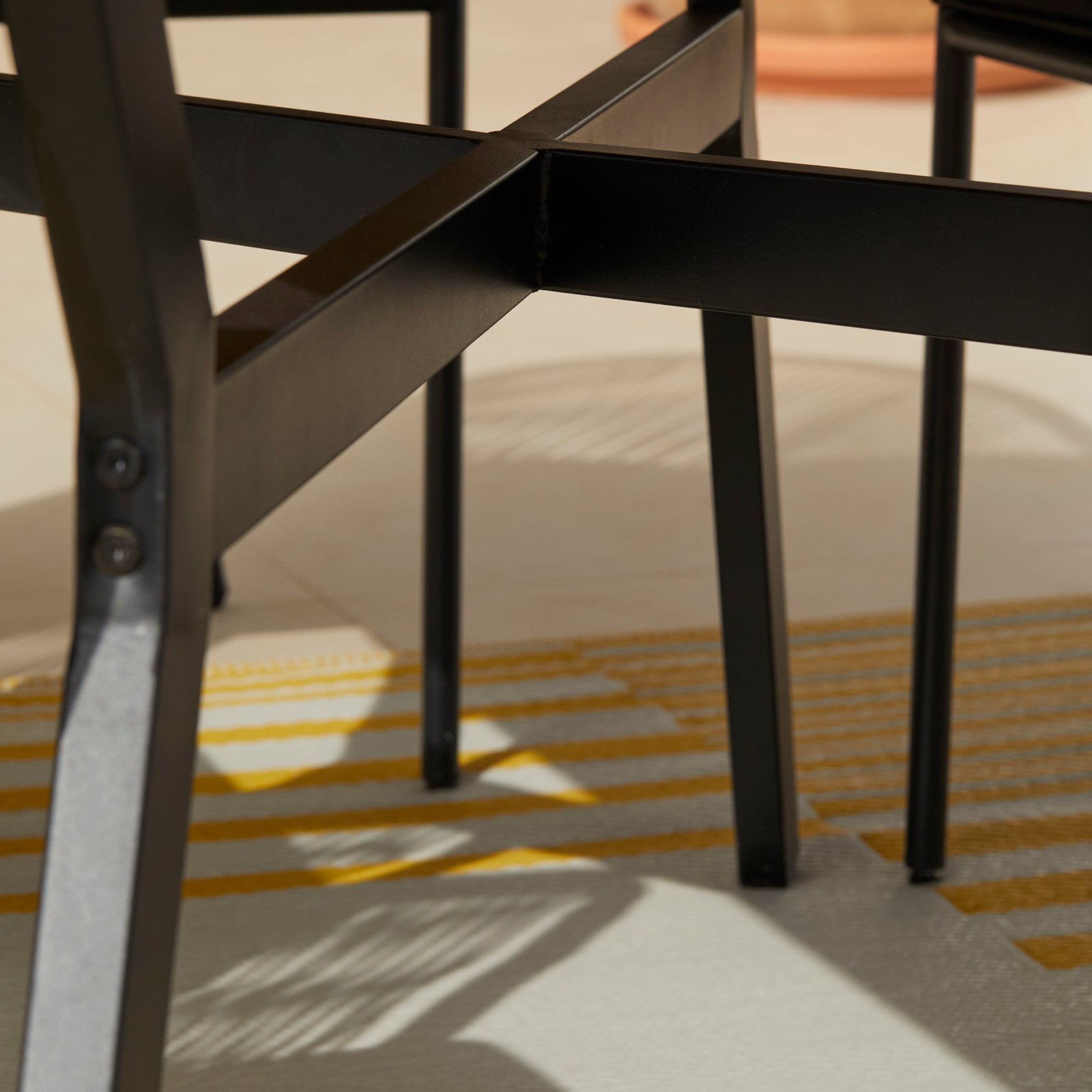 Ezra Oval Wooden Garden Table - White Acacia with Black Metal Legs - Image 8