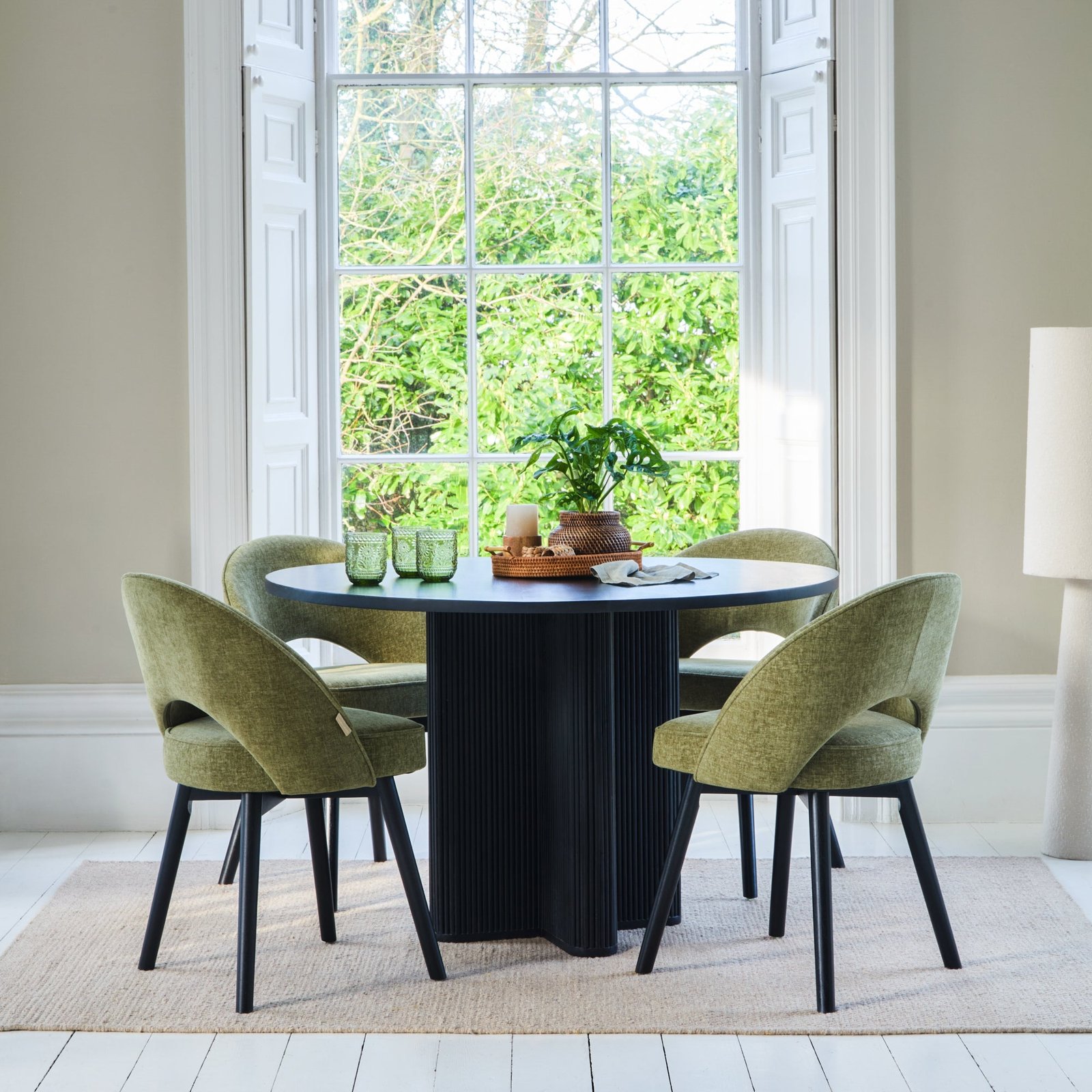 Orla Black Mango Wood Round Dining Table Set - 4 Seater - Marilyn Green Dining Chairs - Black Legs - Image 1