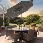 Kemble 6 Seater Rattan Round Dining Set with Grey LED Premium Parasol & Parasol Rain Cover - Grey