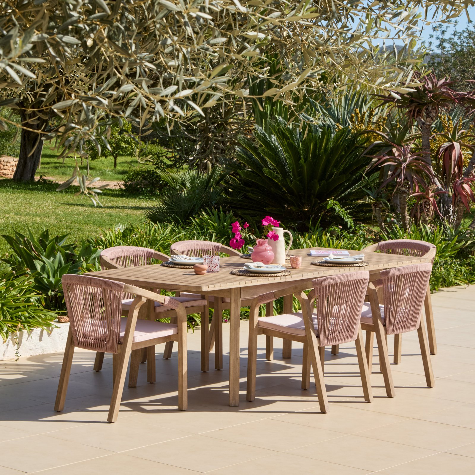 Saffron 6 Seater Extending Wooden Garden Dining Set with Shiro Pink Rope Chairs - Image 1