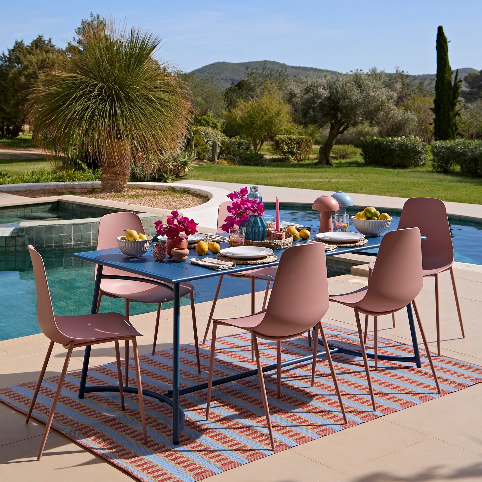 Wilder 6 Seater Blue Table Garden Dining Set with Wren Pink Chairs - Image 1