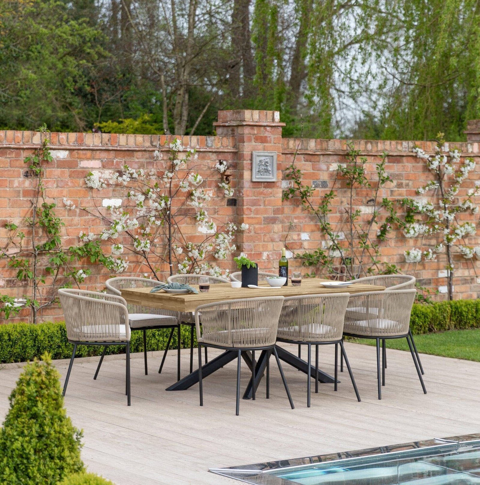 amelia-8-seater-natural-wood-black-legs-garden-dining-set-hali-natural-chairs-laura-james-1_1cf8b0a8-6857-4e63-9cab-13ef8e6501e5 Amelia 8 Seater Natural Wood Black Legs Garden Dining Set - Hali Natural Chairs