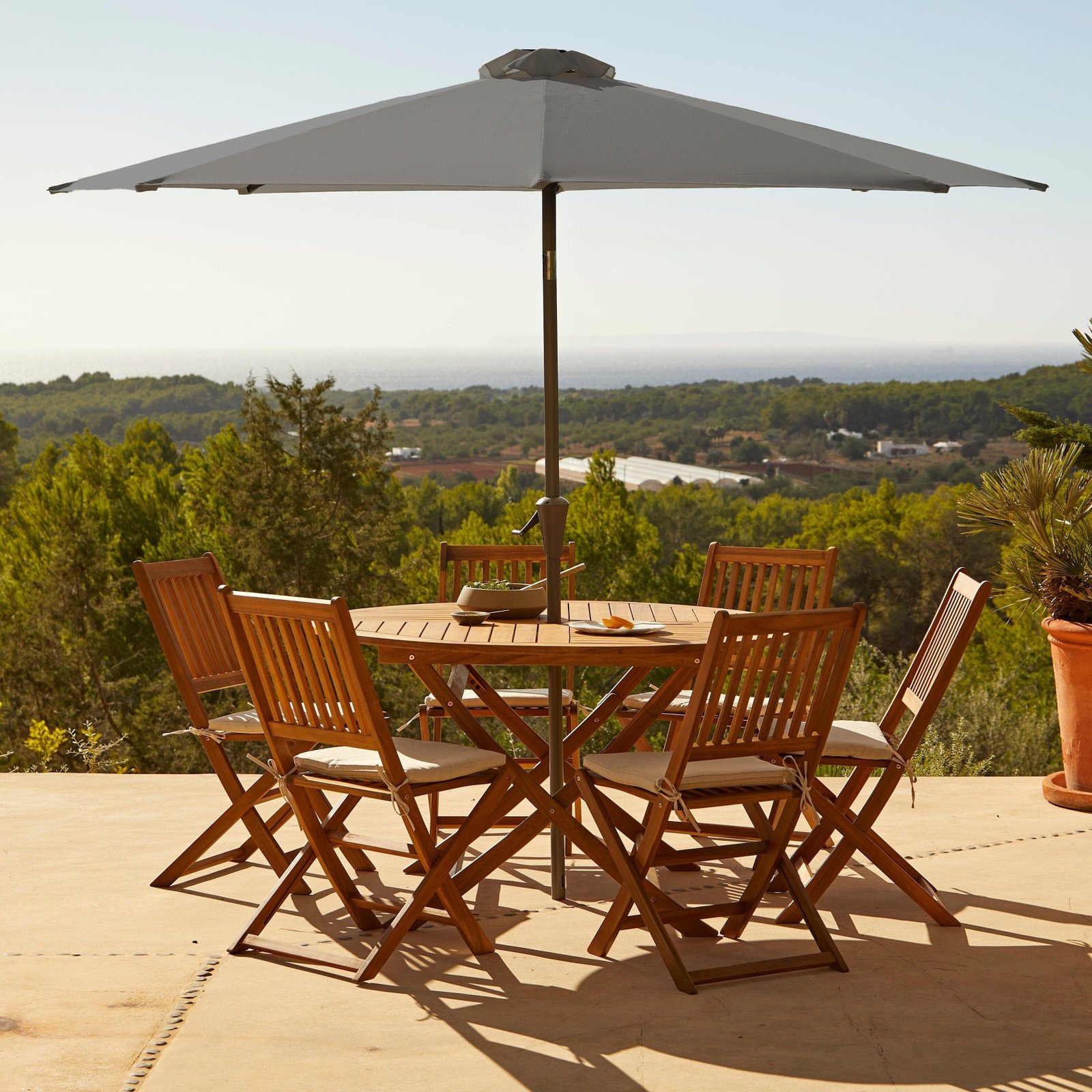 ashby-6-seater-wooden-round-garden-dining-set-with-premium-grey-led-parasol-130cm-laura-james-1 Ashby 6 Seater Wooden Round Garden Dining Set with Grey LED Premium Parasol - 130cm