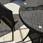 Kemble 4 Seater Rattan Round Dining Set with Grey LED Premium Parasol & Parasol Rain Cover - Black Weave - Image 5