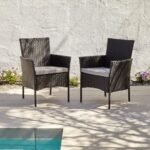 Kemble 6 Seater Rattan Round Garden Dining Set with Cream LED Premium Parasol - Black Weave - Image 2