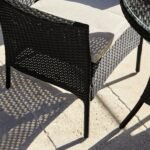 Kemble 4 Seater Rattan Round Dining Set with Cream LED Premium Parasol & Parasol Rain Cover - Black Weave - Image 9