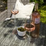 Kemble 6 Seater Rattan Round Dining Set with Cream LED Premium Parasol & Parasol Rain Cover - Grey Weave - Image 5