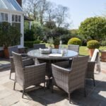 Kemble 6 Seater Rattan Round Dining Set with Cream LED Premium Parasol & Parasol Rain Cover - Grey Weave - Image 7