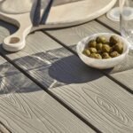 Marston 6 Seater Rattan Garden Dining Set with Cream Parasol - Grey - Polywood Top - Image 4
