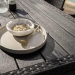 Marston 8 Seater Rattan Garden Dining Set with Cream Parasol - Black - Polywood Top - Image 5