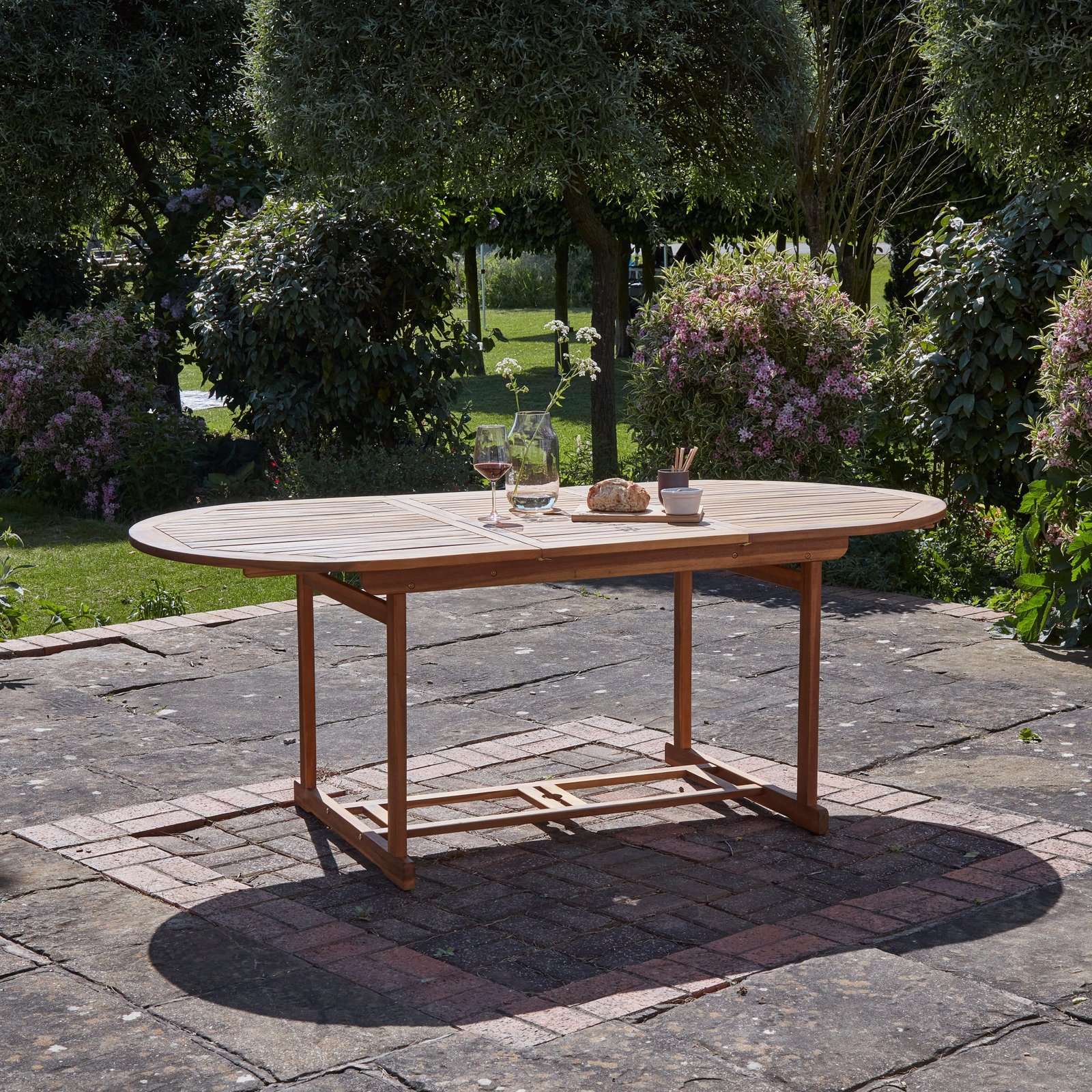 oakley-6-seater-wooden-oval-extending-garden-dining-table-150-200cm-laura-james-1 Oakley 6 Seater Wooden Oval Extendable Garden Dining Table 150-200cm